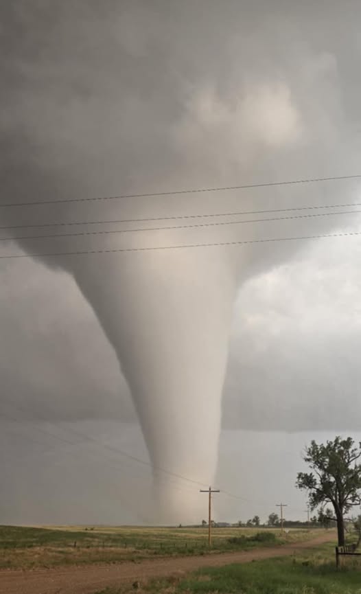 Large tornado over open terrain
